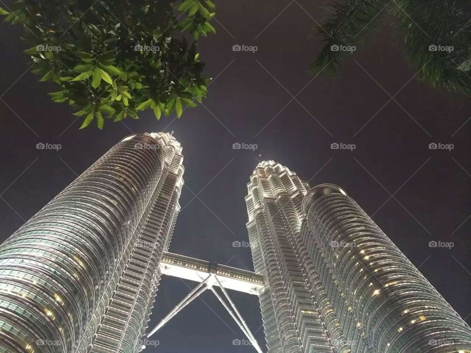 The Petronas Twin Towers, once the world's tallest skyscraper, are still the world's tallest twin towers and the 16th tallest building in the world. Located in the heart of Kuala Lumpur