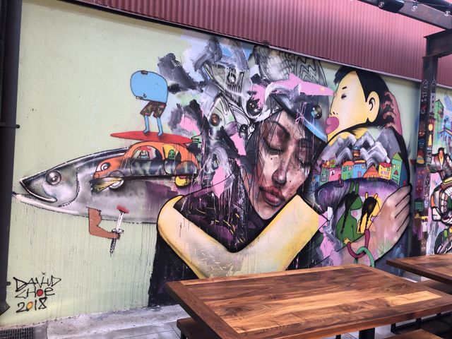 A portion of David Choe’s mural on the wall of David Chang’s restaurant near Chinatown in Los Angeles 