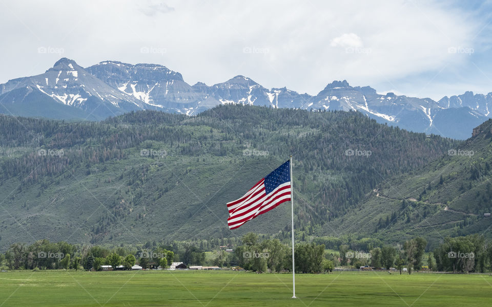 The Magical Outside-Large US Flag with Mountain Backdrop