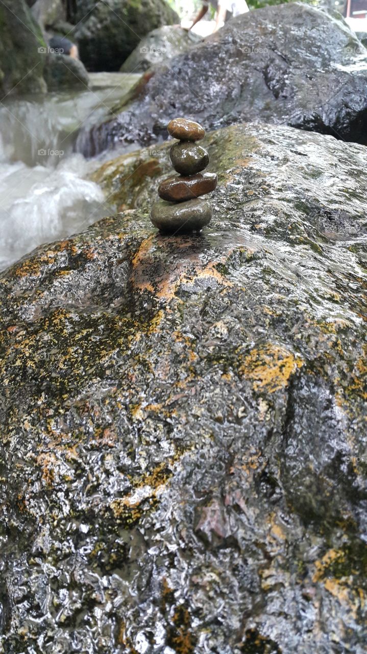 stones balance by the river natural environment