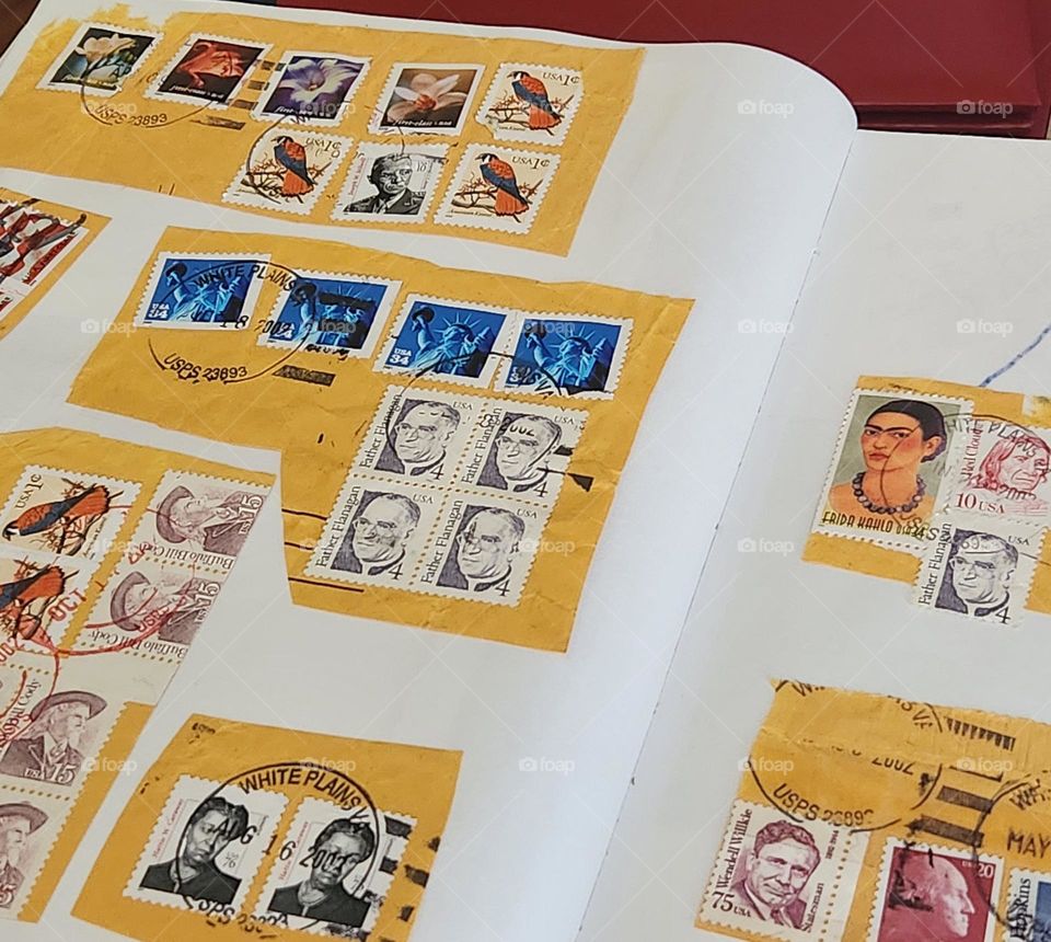 a scrapbook of postal stamp memories of packages received from friends around the world