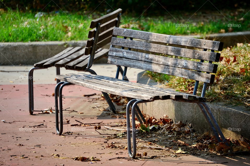 Empty benches in park