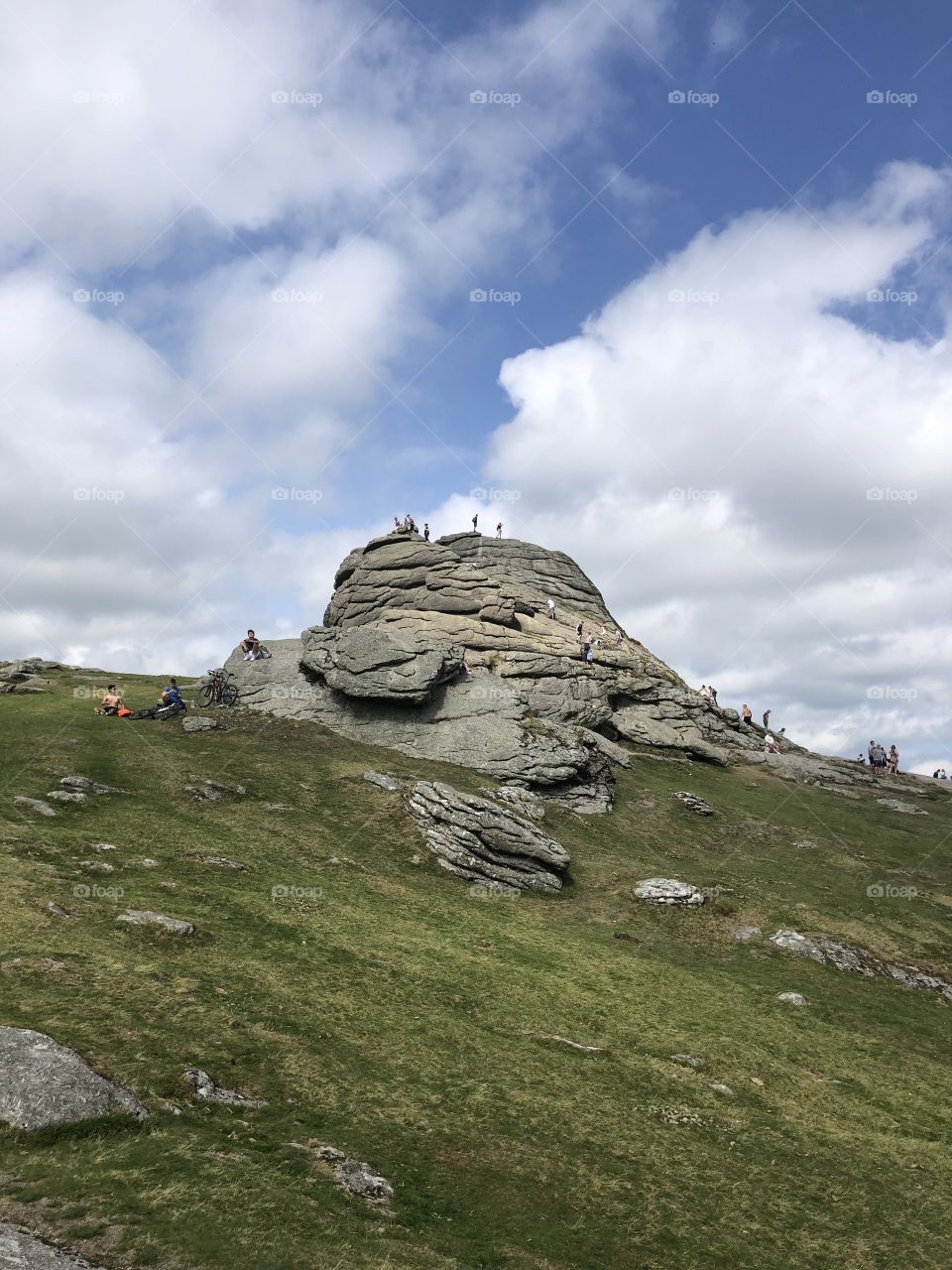 Witnessing the popularity of Dartmoor National Park’s famous Haytor, Devon on a hot melted of a day.