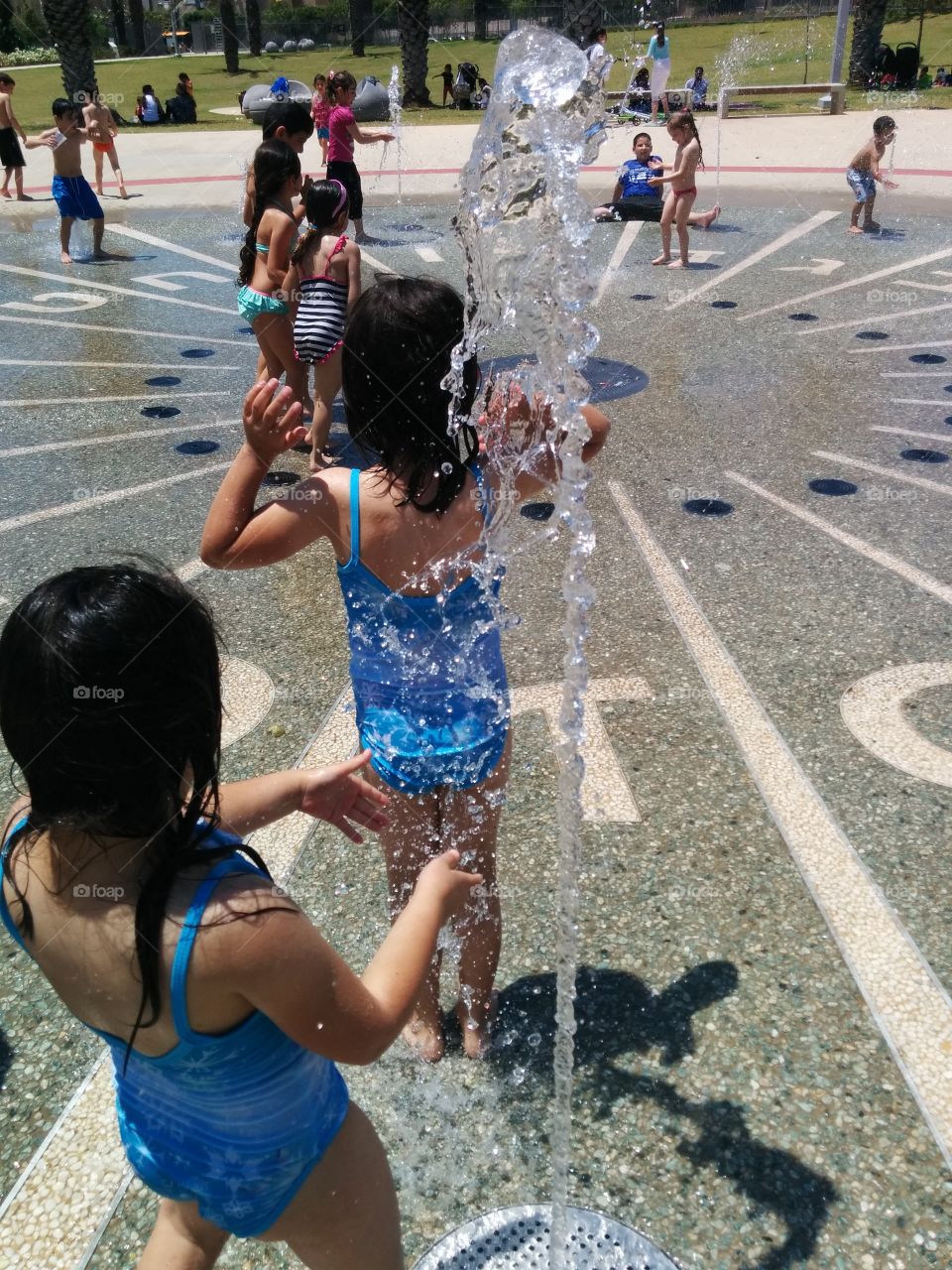 Sisters. Sisters play with water 