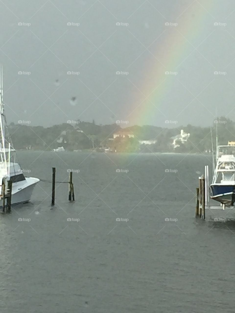 End of Rainbow. I saw that the rainbow ended between these two boats. How cool!  
