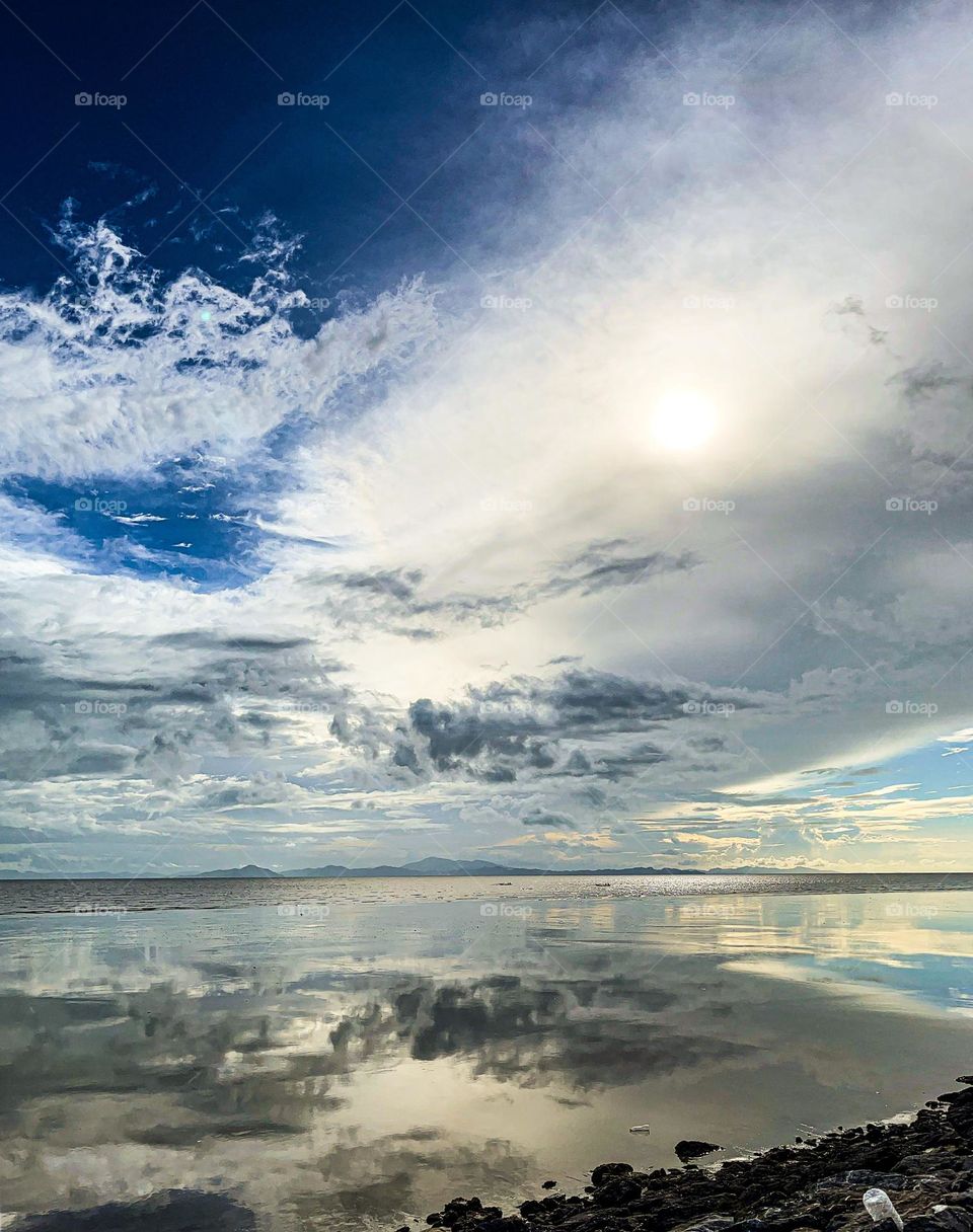 Clouds reflection on the sea surface
