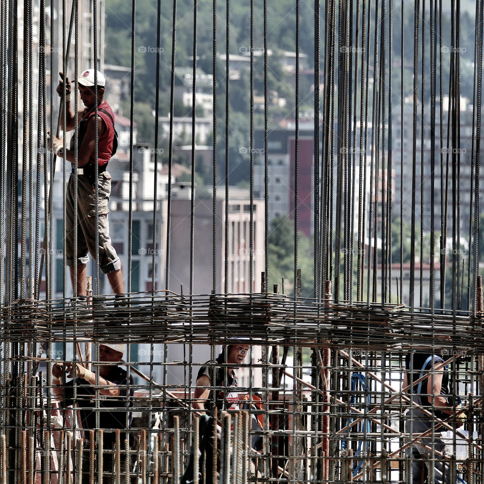 workers . hard work on building 