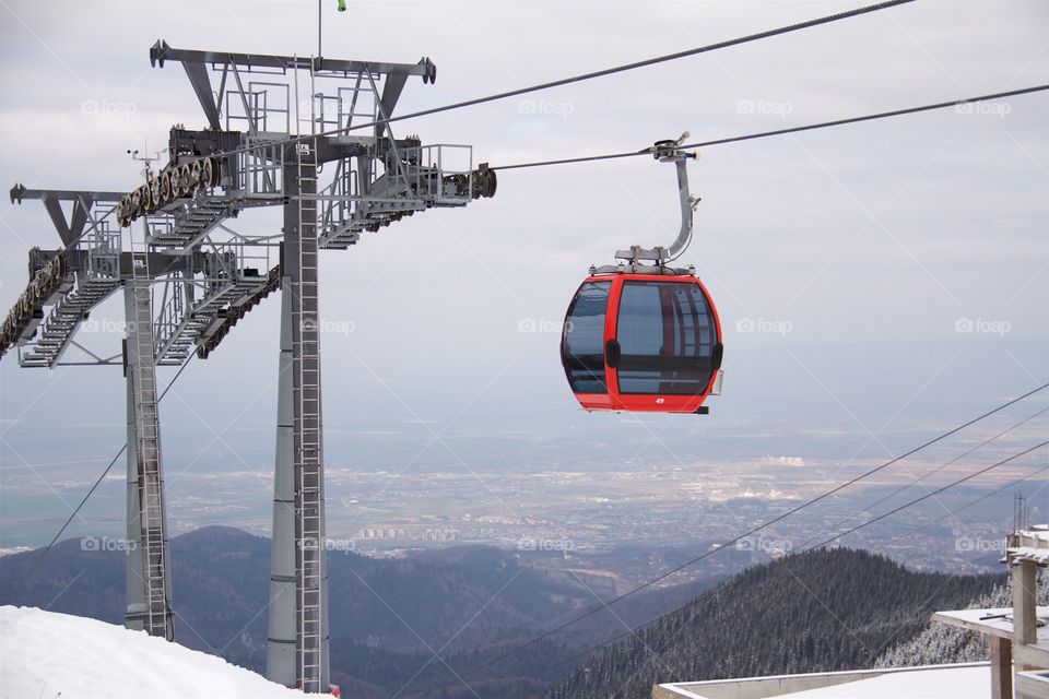 Overhead cable car in snow