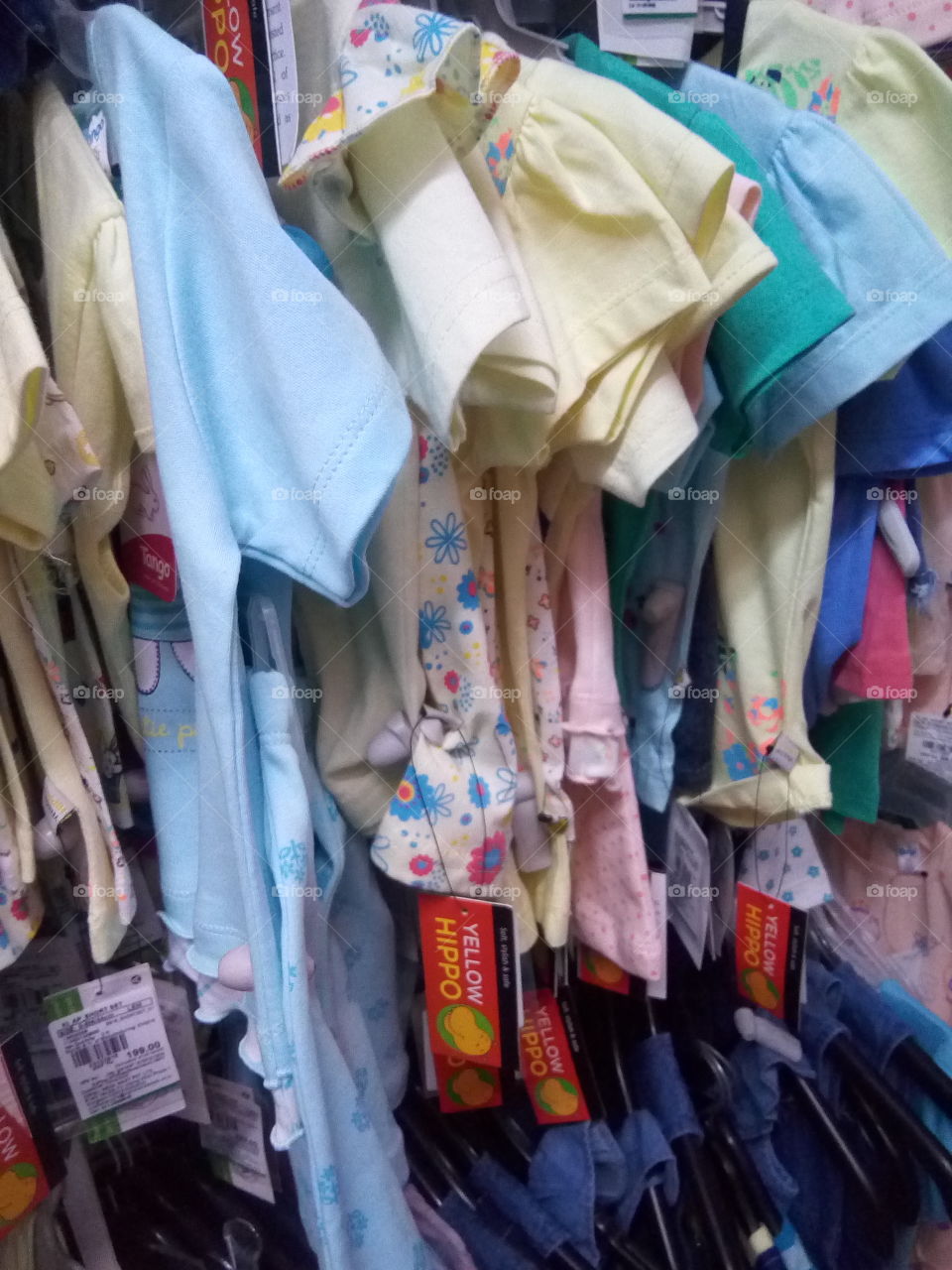 beautiful shirts hanging in a shop