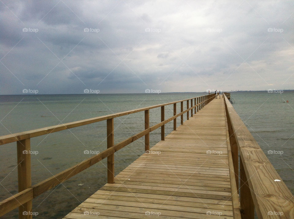 grey weather bridge sea by chattis