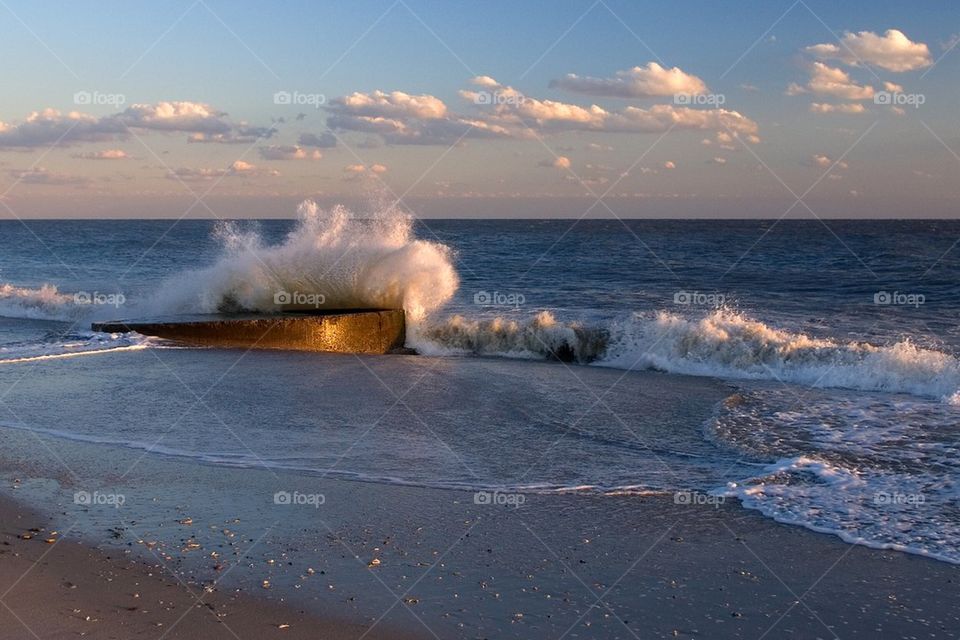 Waves crashing on the beach #a1722