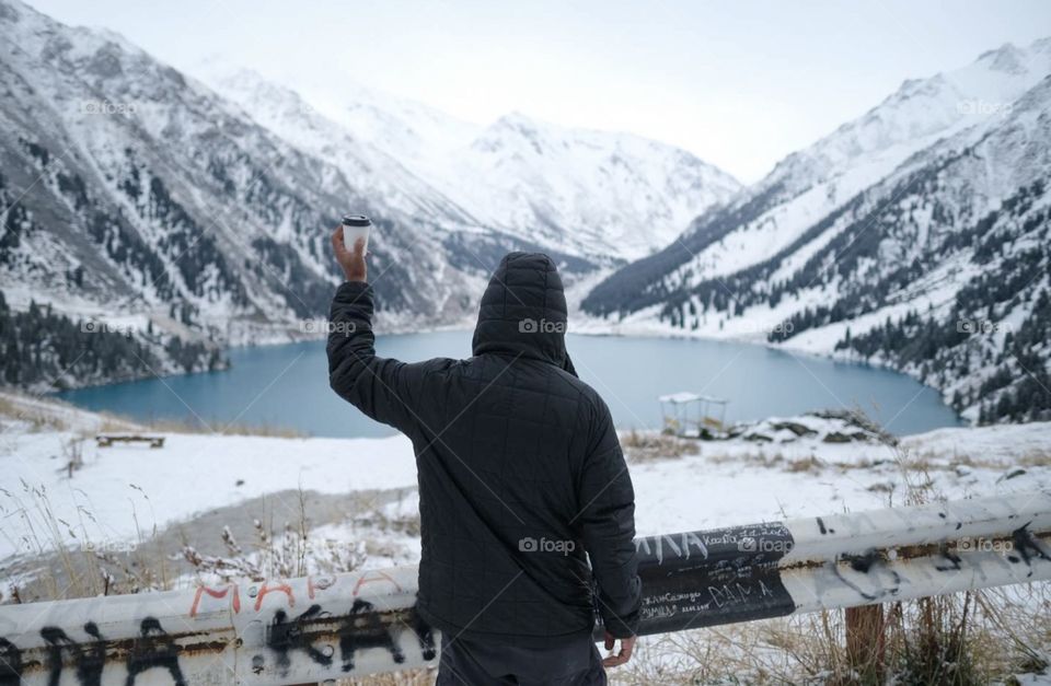 Finale... hot tea in snowing day on big Almaty lake , Kazakhstan