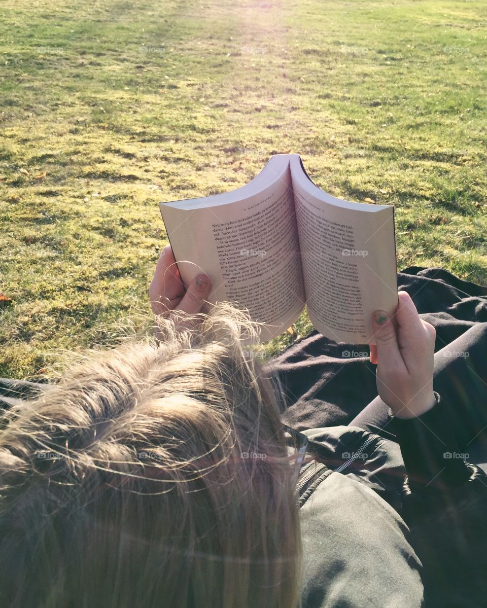 Girl reading in the park