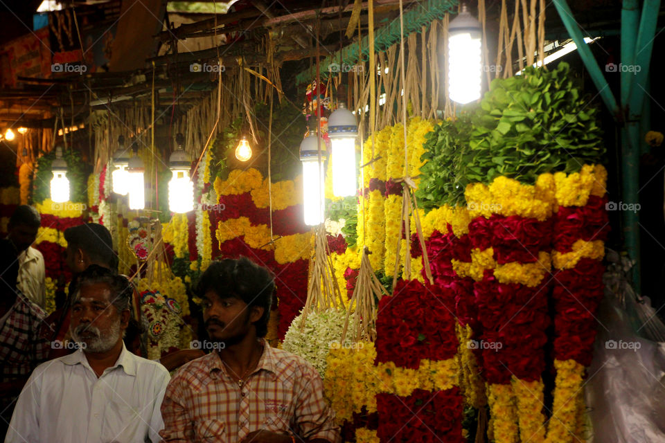 Flower garland sellers in flower market