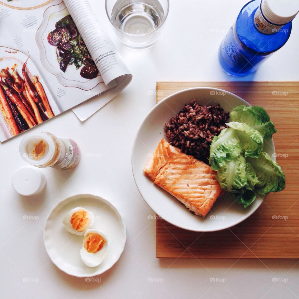Easy healthy meal . Easy healthy meal with grilled salmon served with black rice and boiled egg.