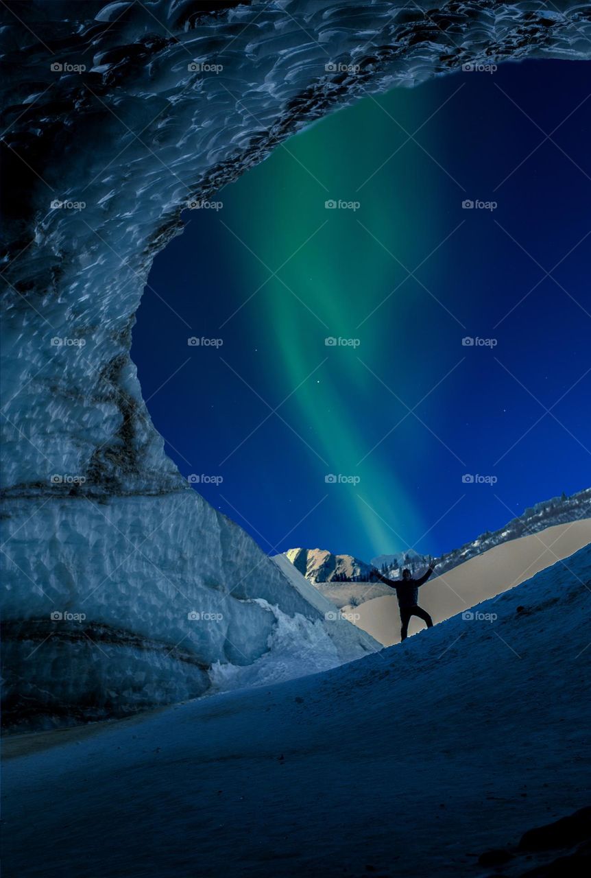 Frozen cave and Aurora borealis 