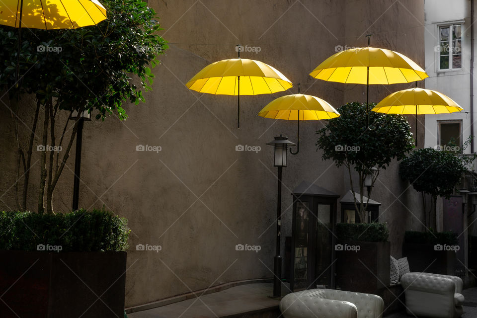 hanging yellow umbrellas