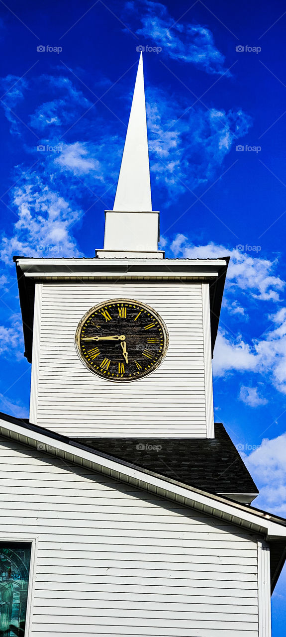 church clock against sky