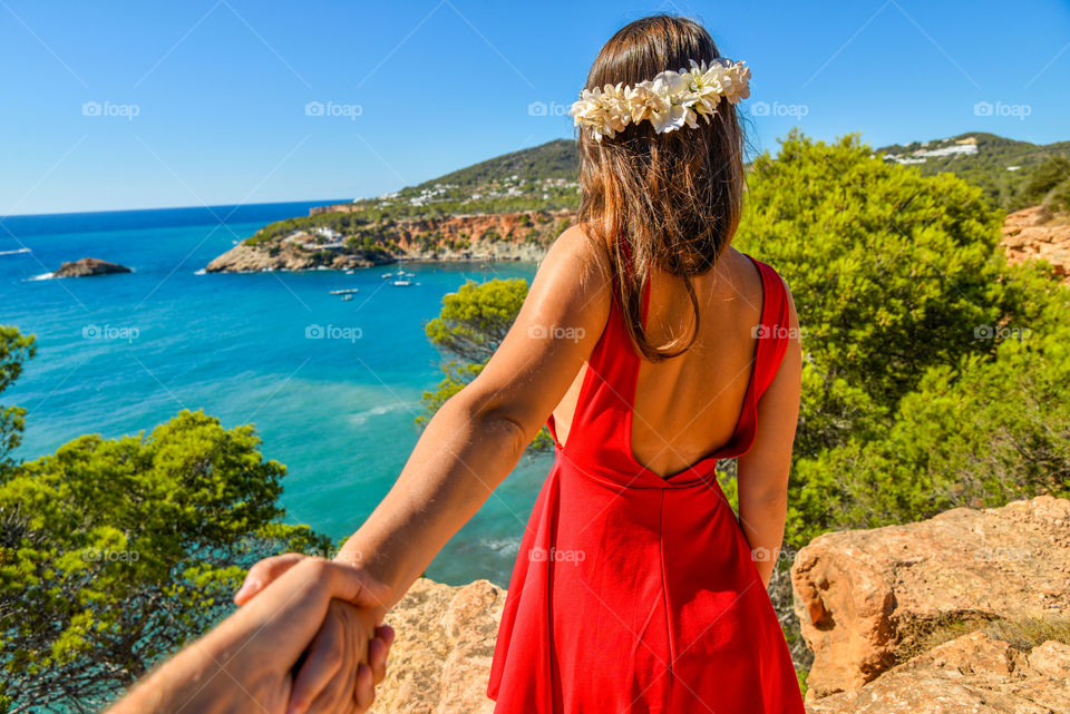 Close-up of a person holding hands of women