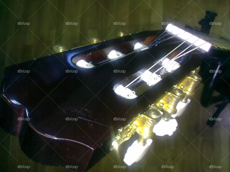 This is the Handle and keyboard of my Spanish classical guitar I love music Bossa nova the jazz classical music Jazz and all the music of all kinds