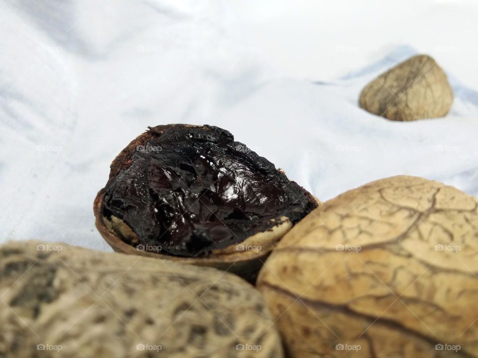 closeup of flesh of pangium edule or kluwek seeds. Indonesian traditional food ingredient