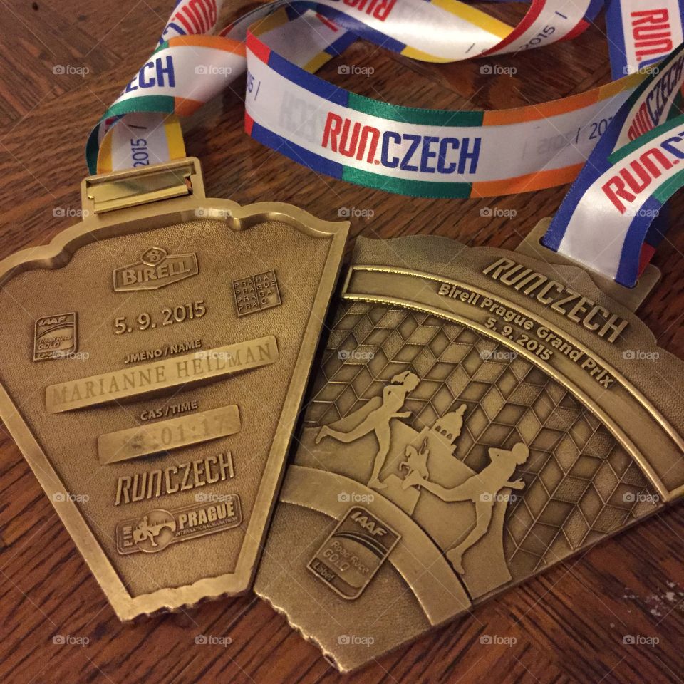 Victory medals from the Birell 10k run in Prague😃