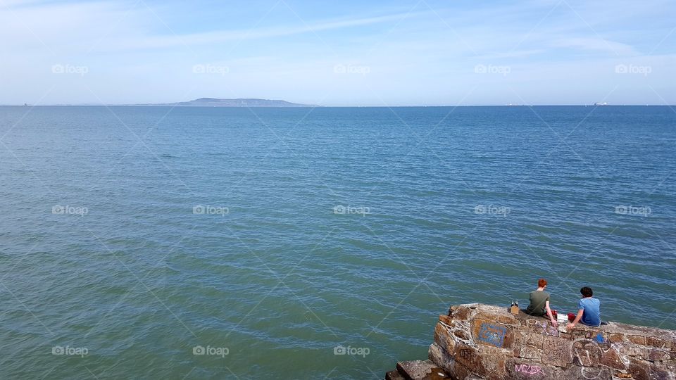 View across Dublin Bay towards the Howth peninsula on a sunny day