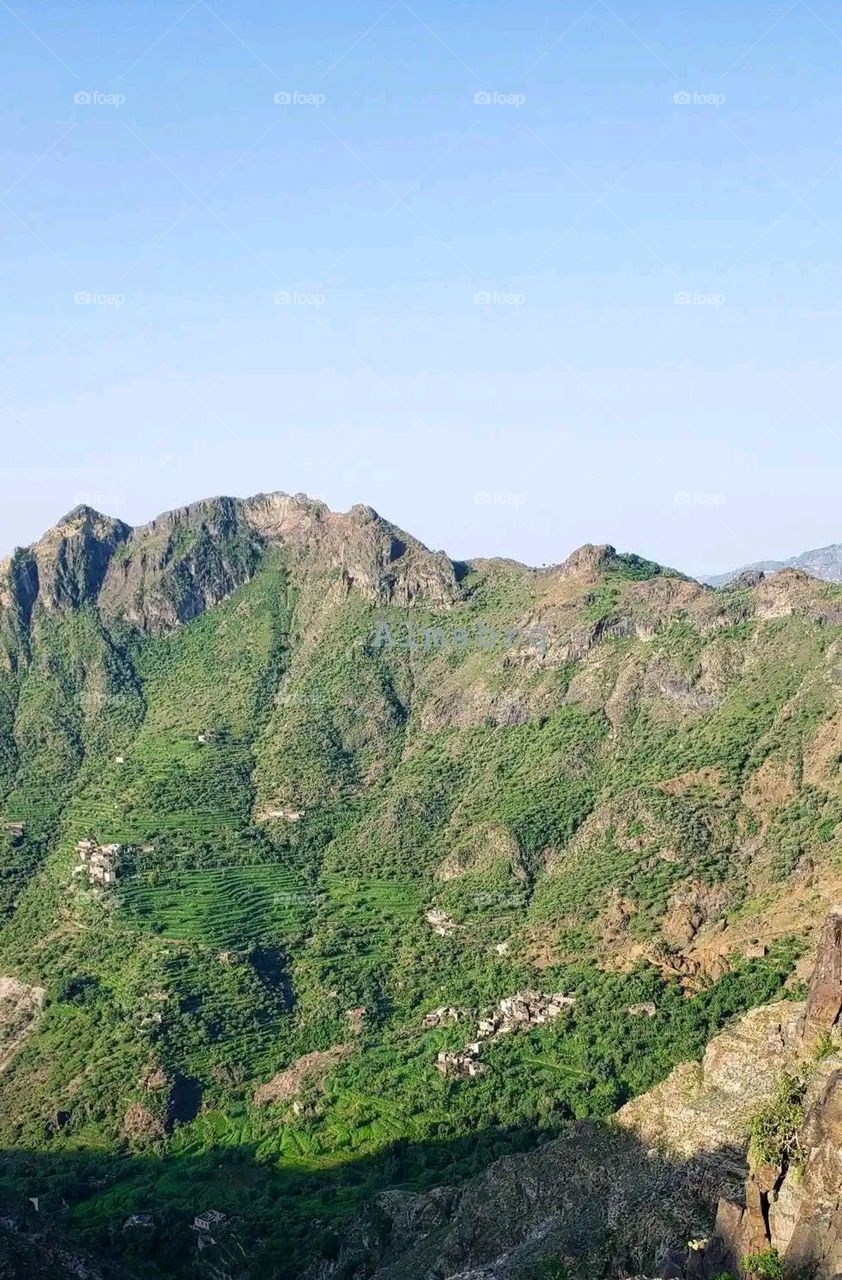 Glory be to God, the magnificent and picturesque view and the natural green trees are a view that is nothing more wonderful than it