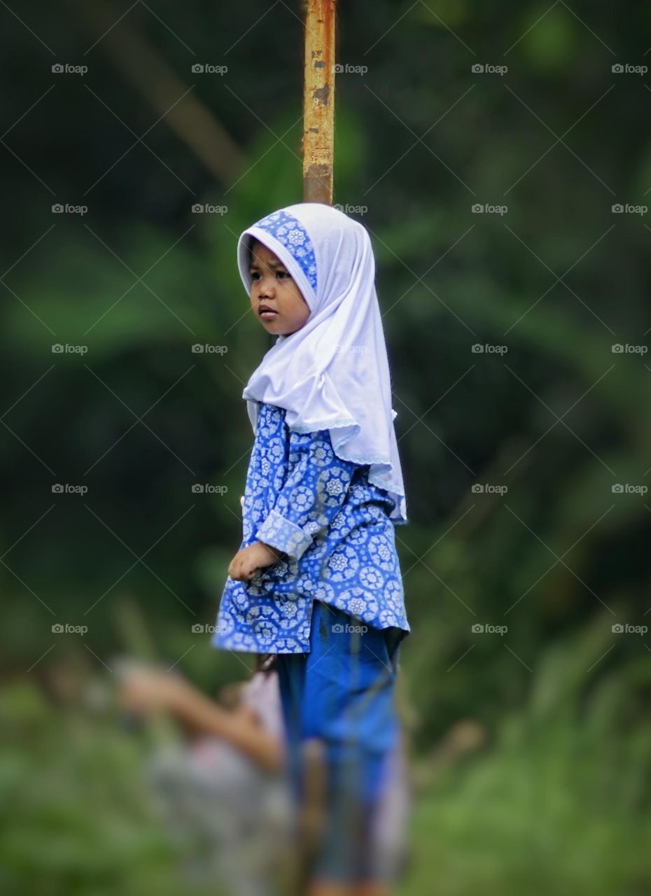 Portrait of a girl in the field.