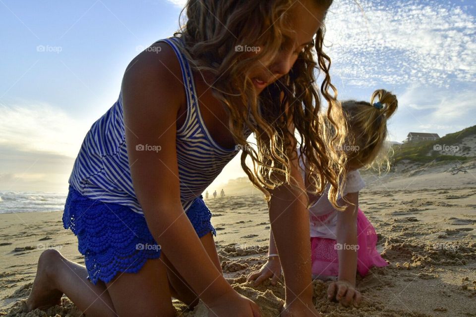 Kids building sand castles