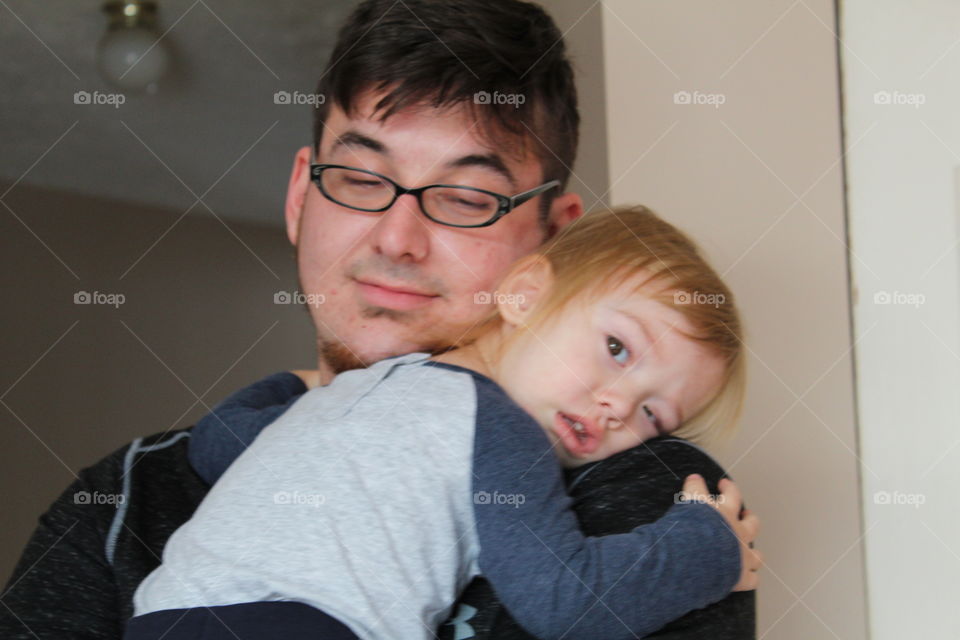 Nothing cuter than a dad and son cuddling