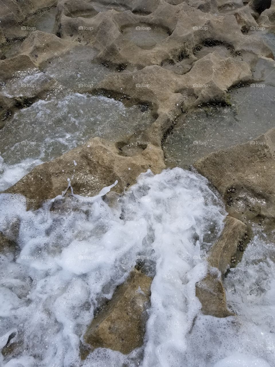 crashing waves on rock