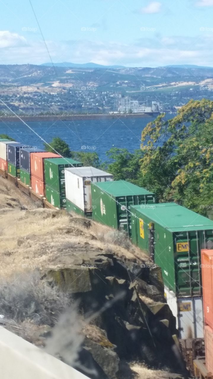 stack train beside Columbia River