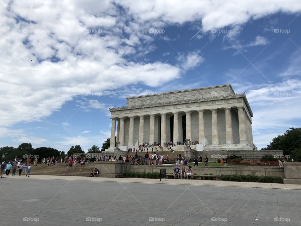 Lincoln Memorial in Washington, D.C. on a summer day with a cloudy summer sky in the background 
