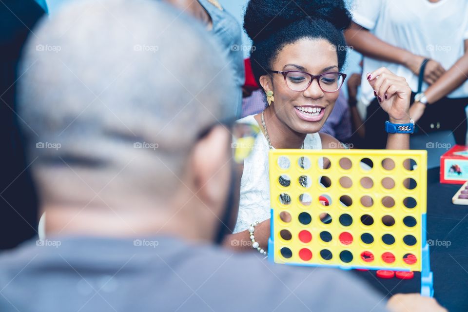 Smiling woman playing game