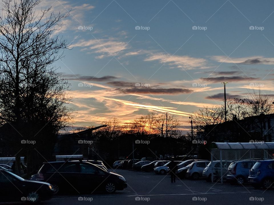 Sunset over a car park