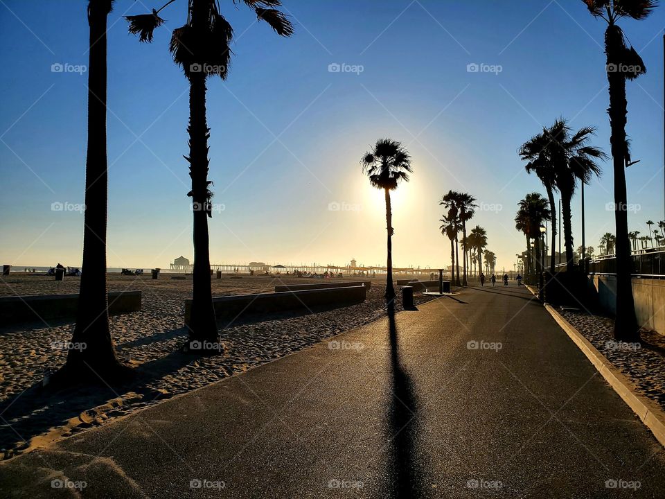 The summer sunset forms a nice backdrop for the Huntington Beach pier in Southern California
