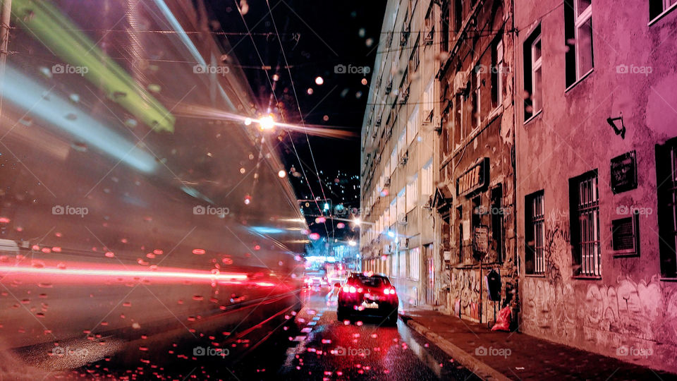 Rain in city with cars long exposure