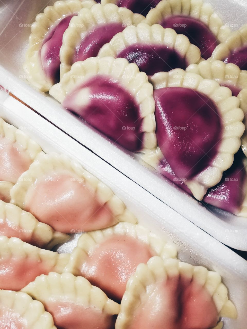 Dumplings filled with berries and strawberries