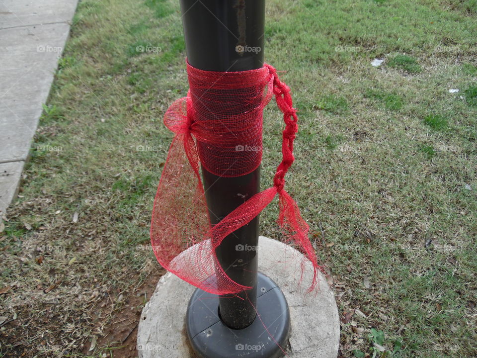 red ribbon 🎀. This is a picture of some homecoming decoration.