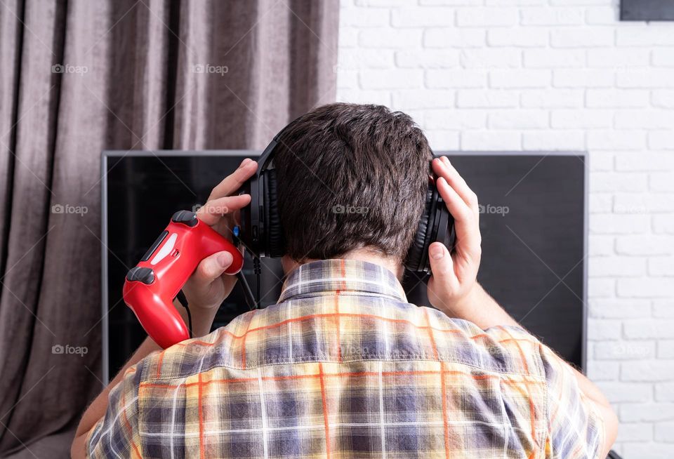 man playing video games