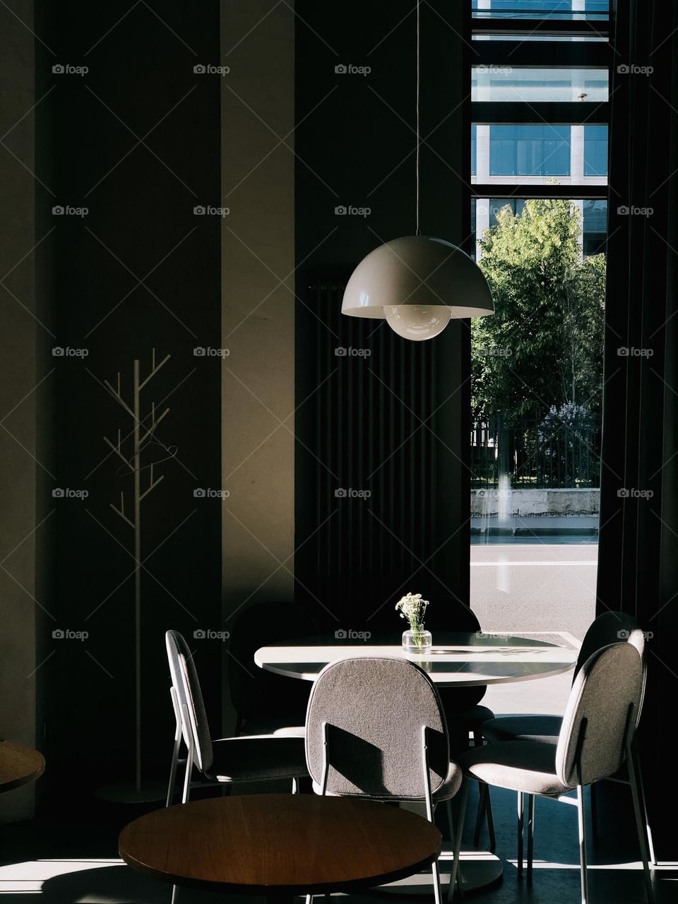 Modern stylish cafe in sunny day 