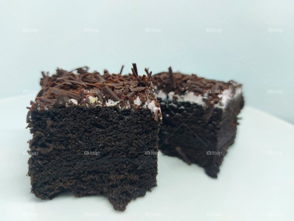 Chocolate taro cake on a white background
