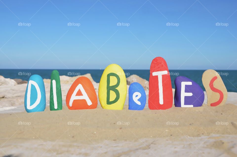 Diabetes, conceptual on colored stones