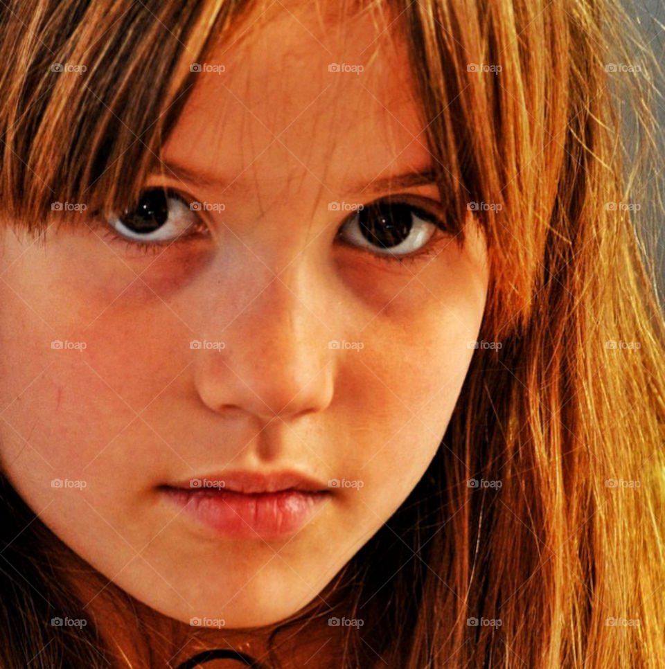 Striking portrait of a serious girl.