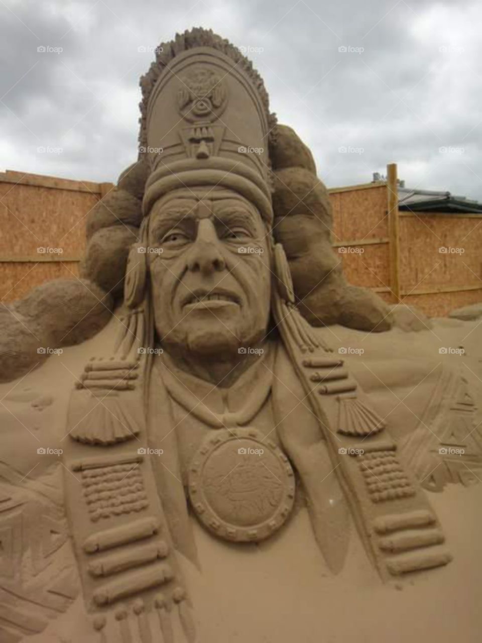 native American man sand sculpture