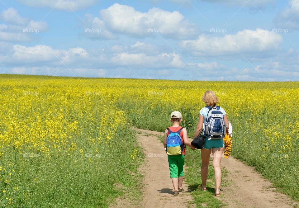 countryside beautiful nature landscape and family mother and son walking