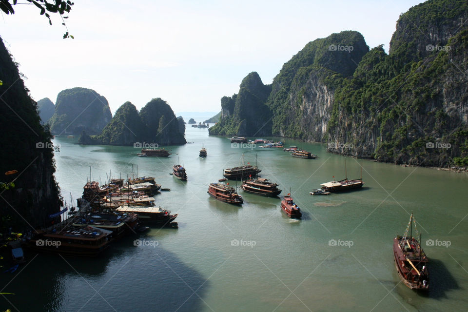 ocean boats dock mountains by mengzishiliu