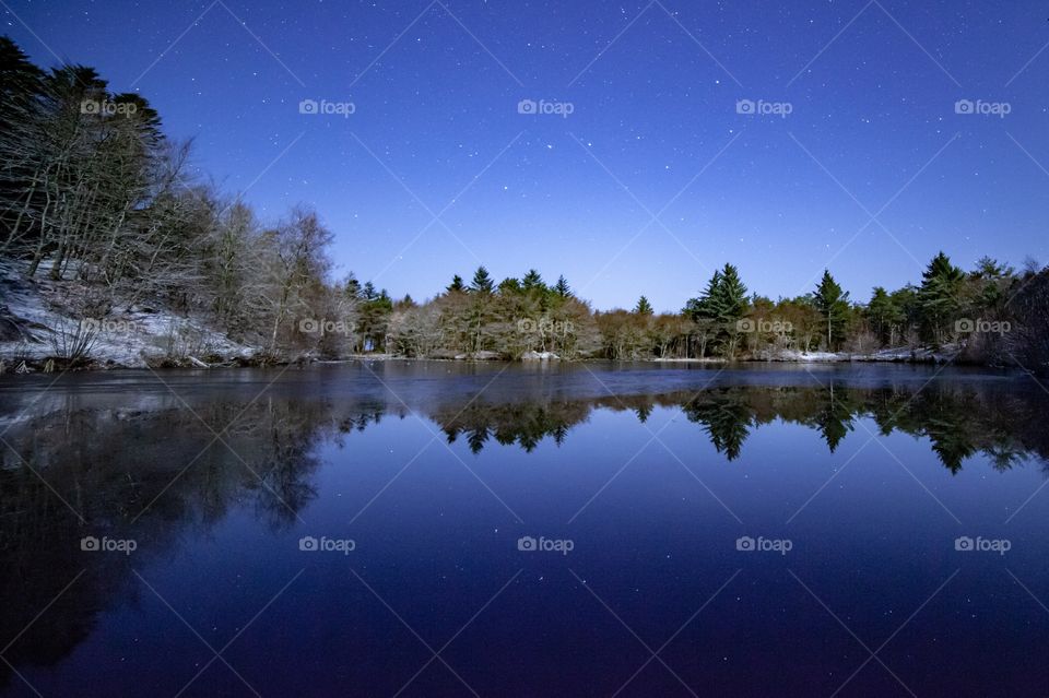 A late night winter photo. It was getting cold, and the lake started freecing. A beautiful night with a lot of stars