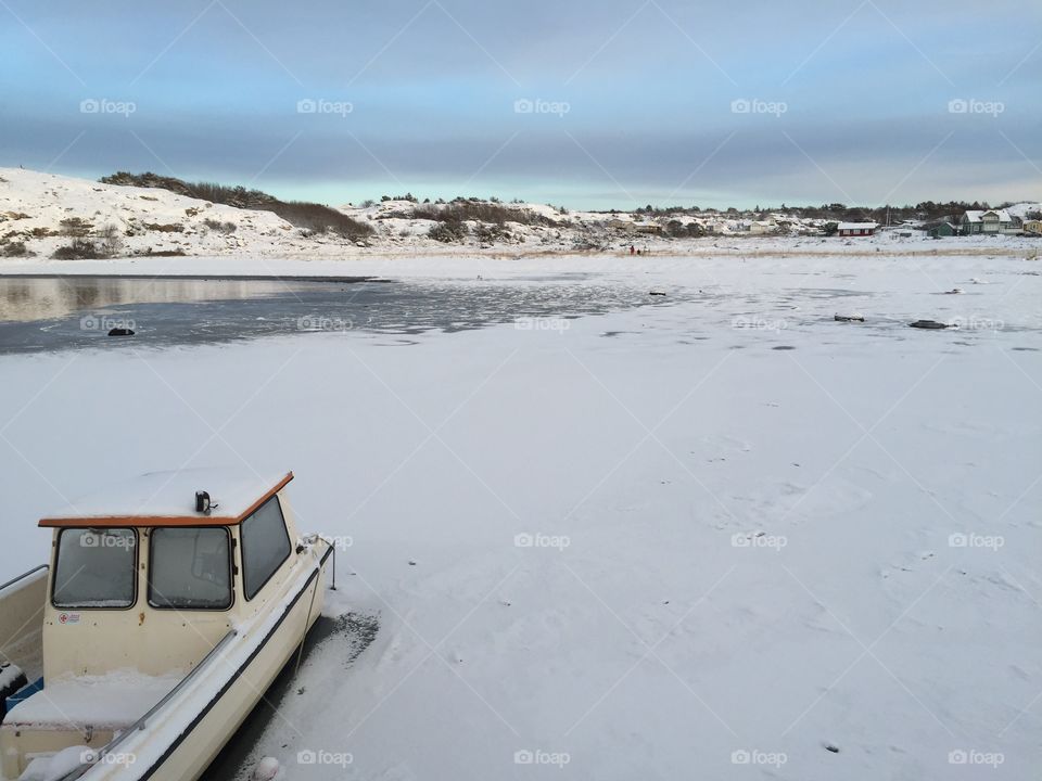 Scenic view of nautical vessel on winter bay